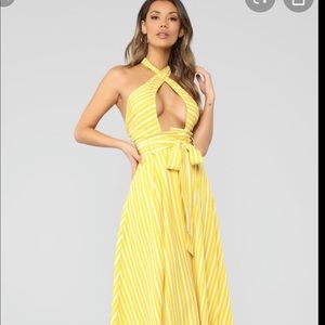Super cute yellow stripe dress. Fits M/L